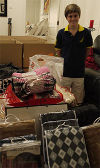 Schoolboy is  lending a helping hand