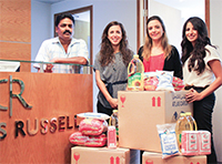 Gulf Weekly Firms back charity drive