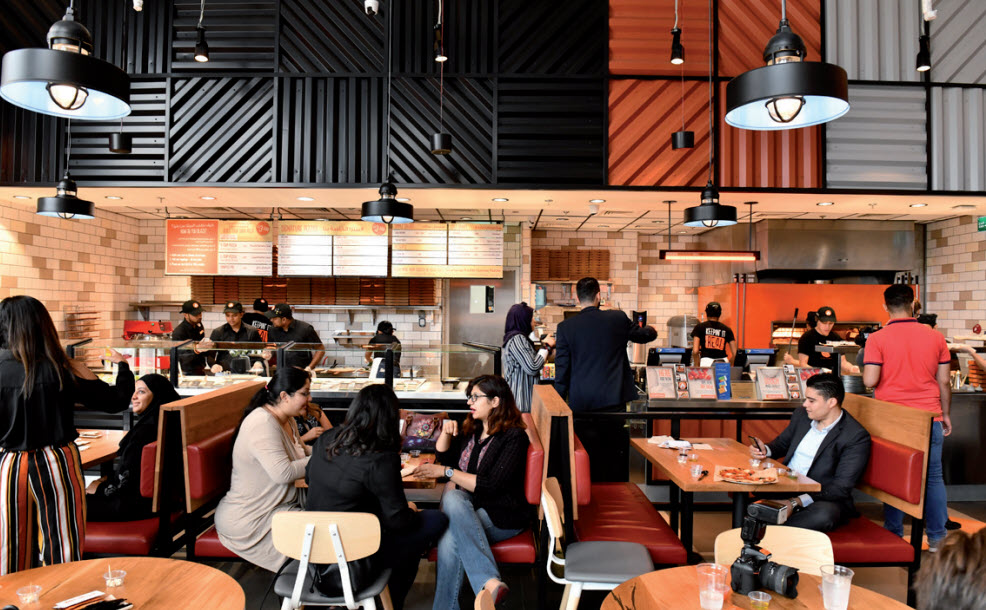 Gulf Weekly New pizza palace opens in blaze of glory