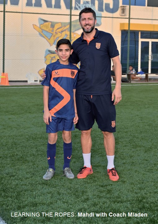 Gulf Weekly Boy on the ball